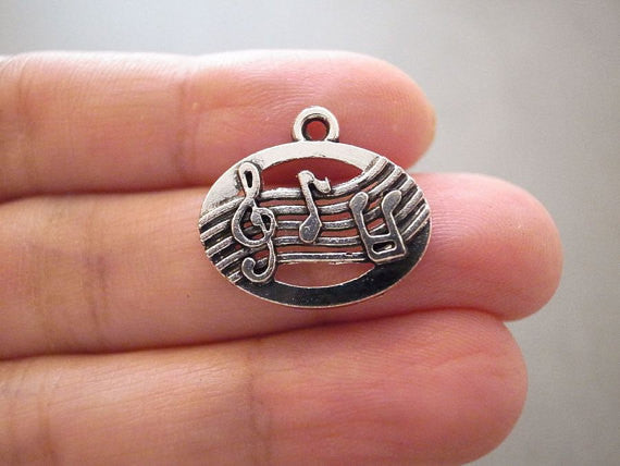 Musical notes charm