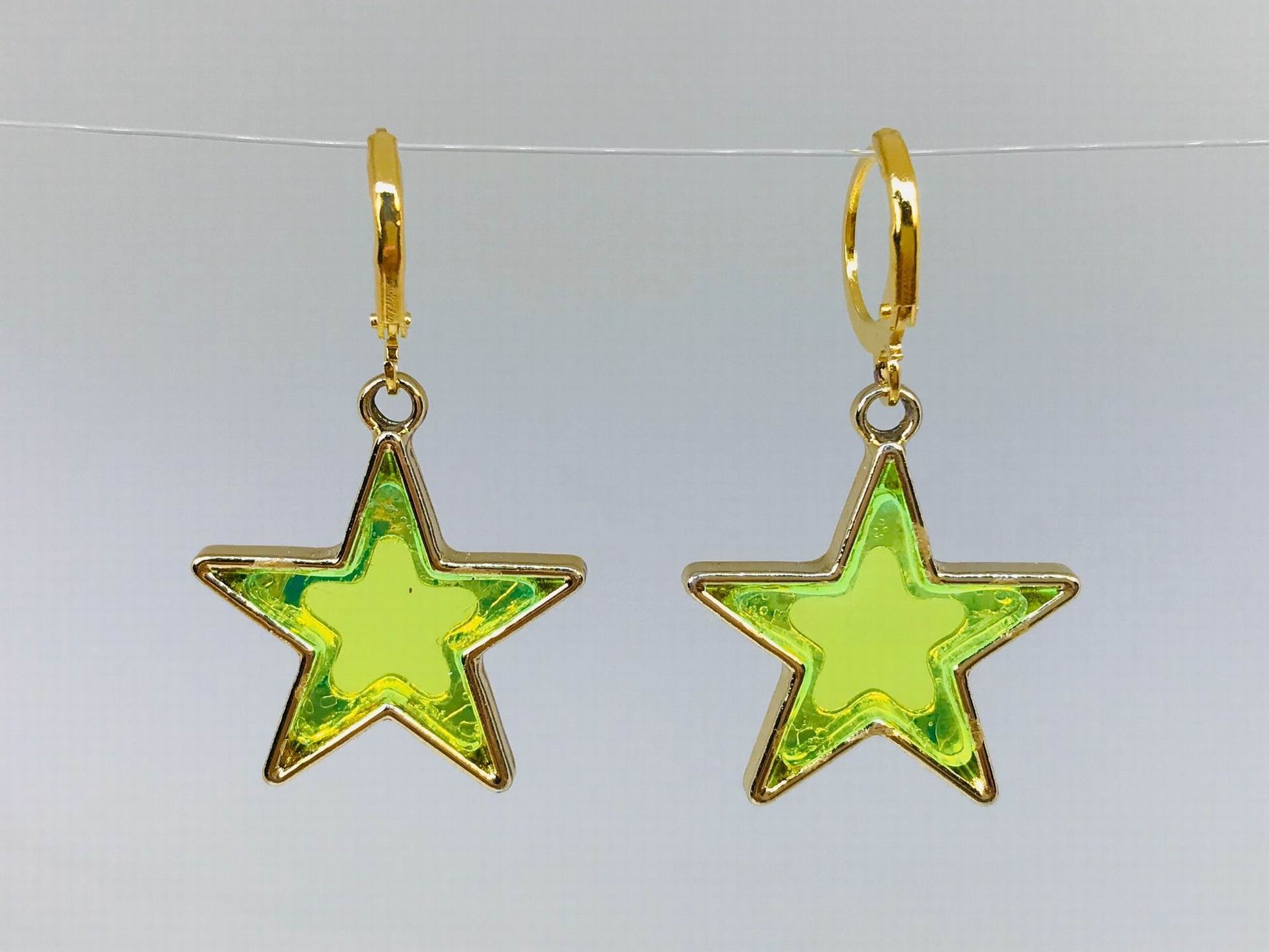 green Star huggie earrings