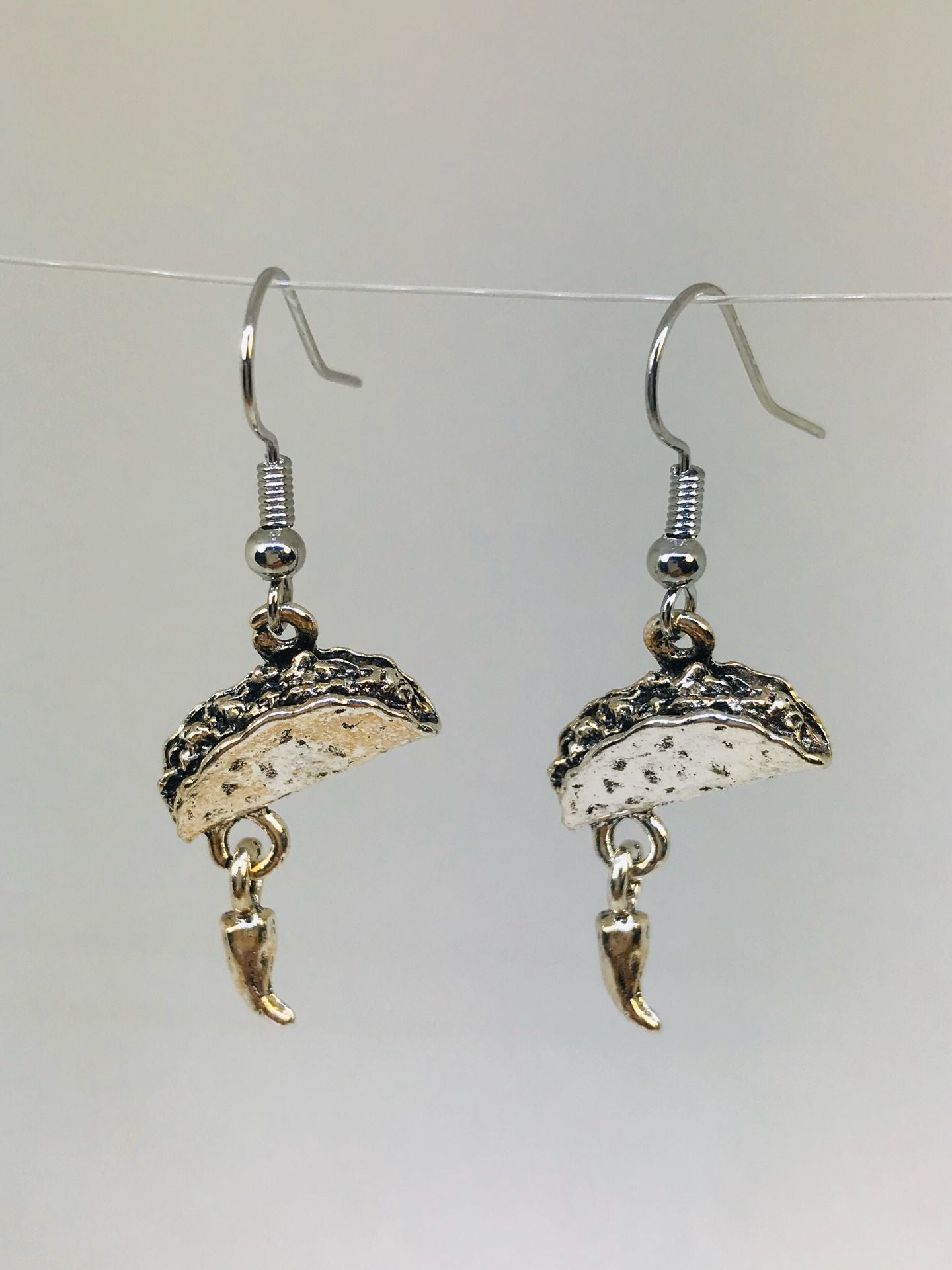 silver taco charm earrings